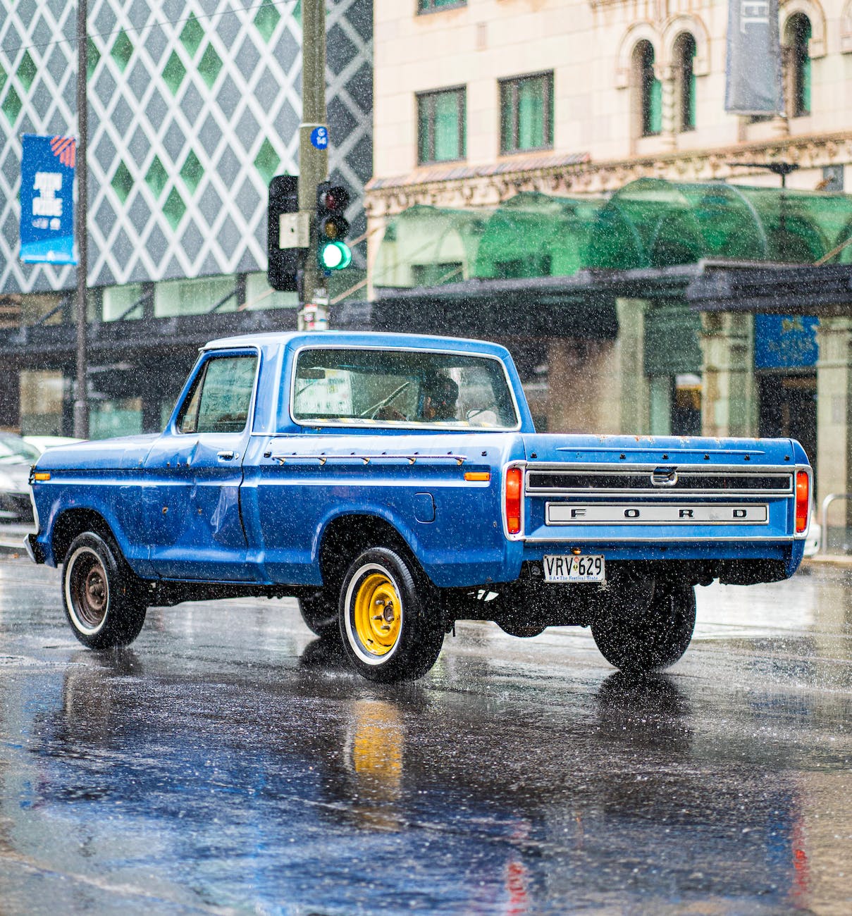 a Blue Pickup Truck on the Road