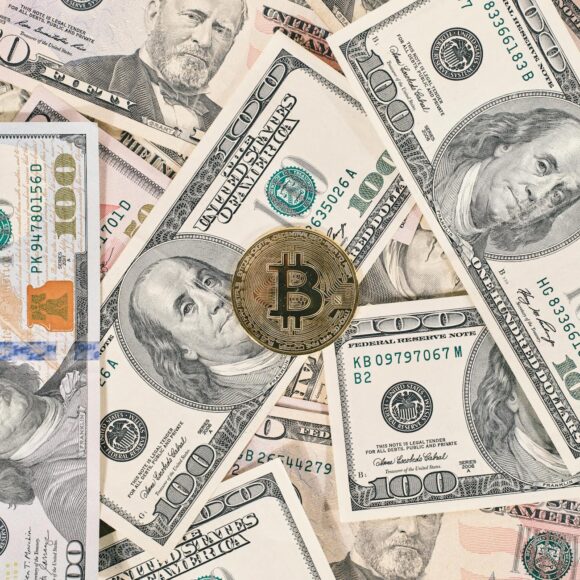bitcoin on american dollar banknote close up